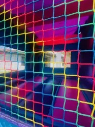 IMG 8187 1767206233 Purple, pink, blue and green bounce castle with hoop